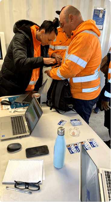 Sara on site in hard hat